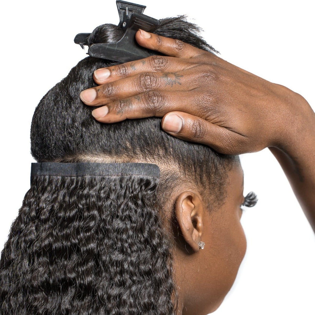 SEAMLESS CLIP IN HAIR EXTENSIONS
